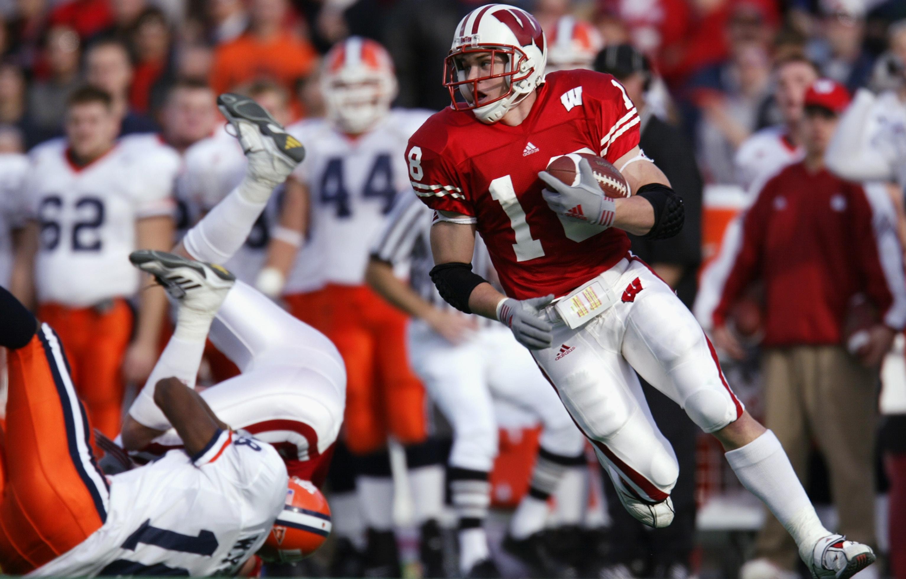 Jim Leonhard rushes for yardage.