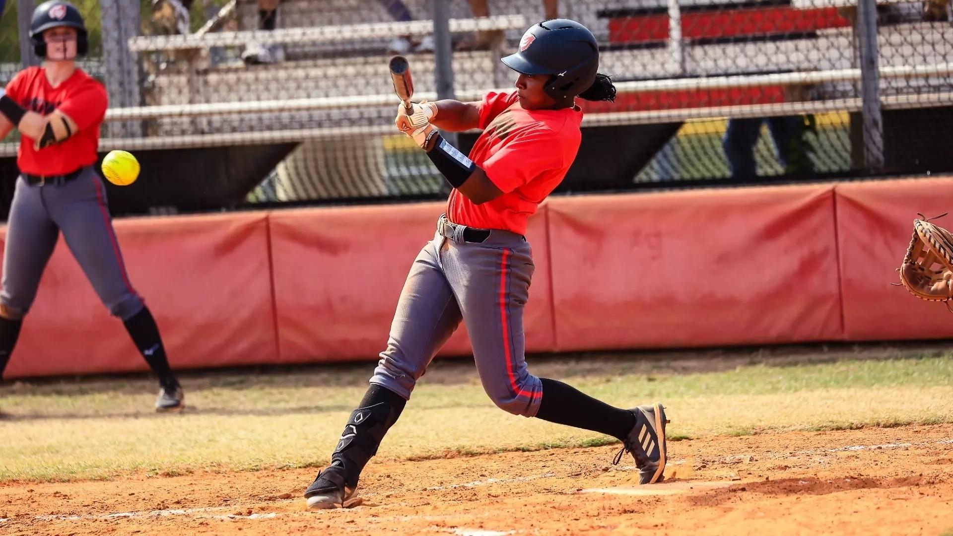 Marissa Mitchell slugs a home run for West Alabama. 